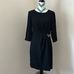 Never worn versatile dress with gold accent
